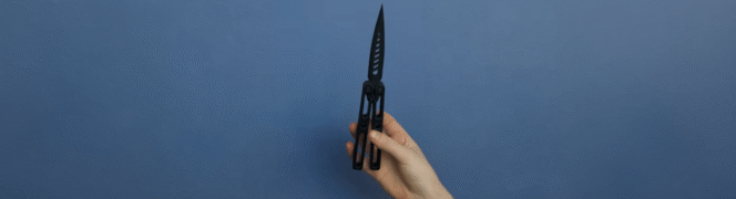 A hand demonstrates a 3D-printed butterfly knife as part of The Beam's investigation into untraceable weapons in Arizona schools