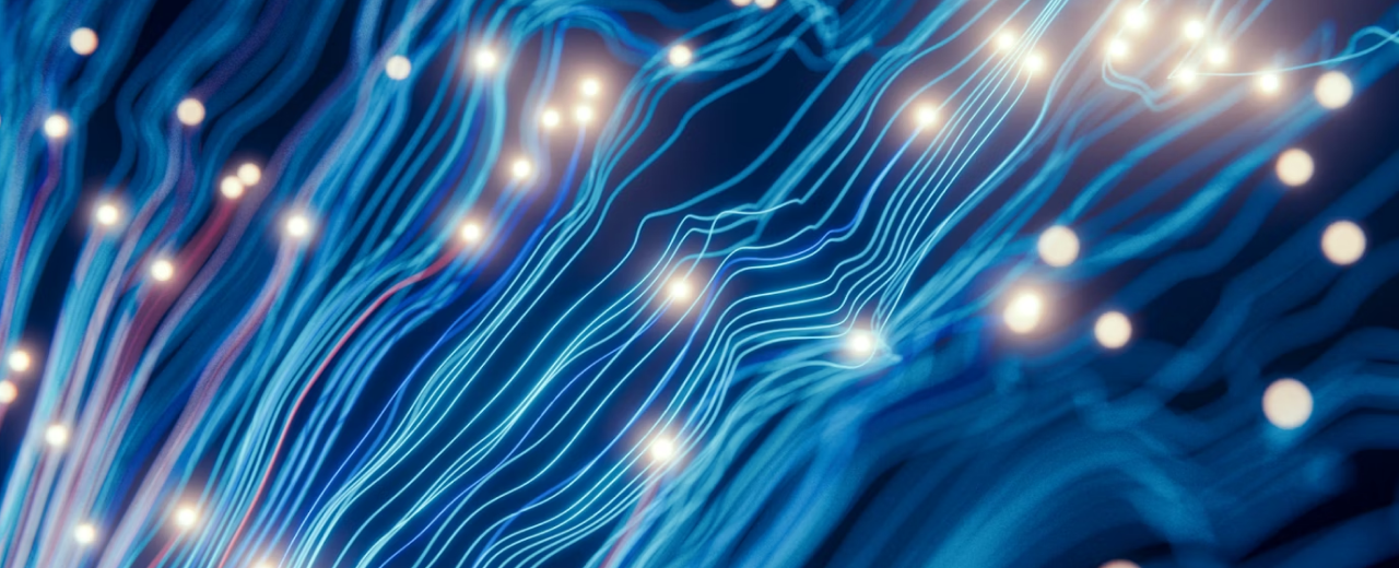 Abstract design showing flashes of lights over streams of blue.