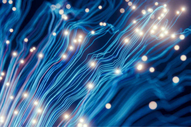 Abstract design showing flashes of lights over streams of blue.