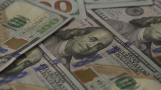 Pile of $100 bills