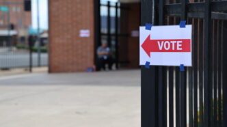 A sign saying vote