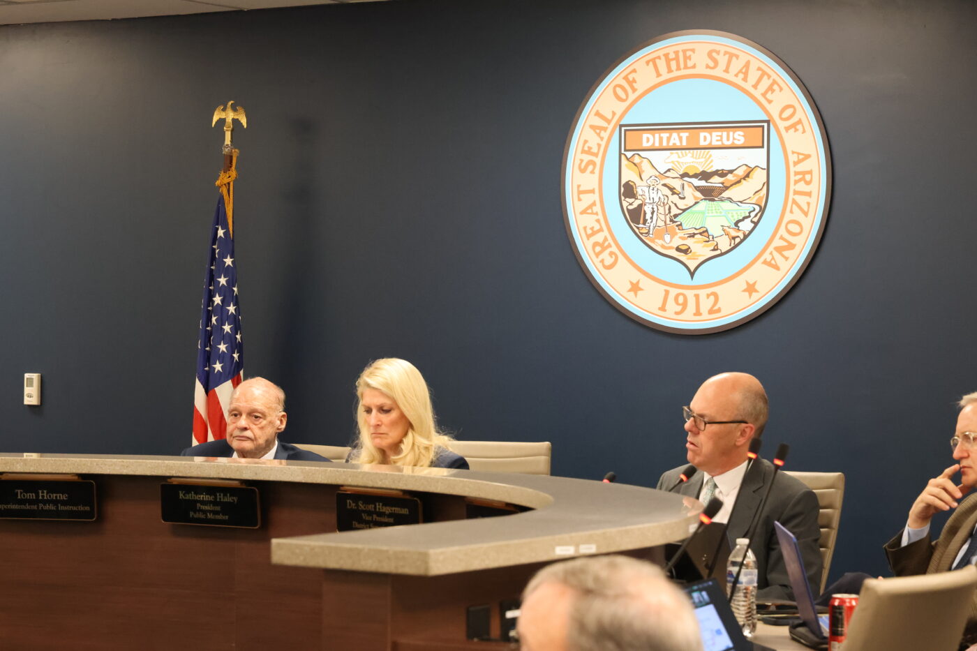 Members of the Arizona State Board of Education, discussing changes to the state's A-F letter-grade system.