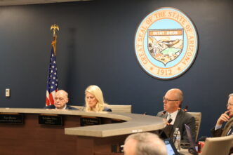 Members of the Arizona State Board of Education, discussing changes to the state's A-F letter-grade system.