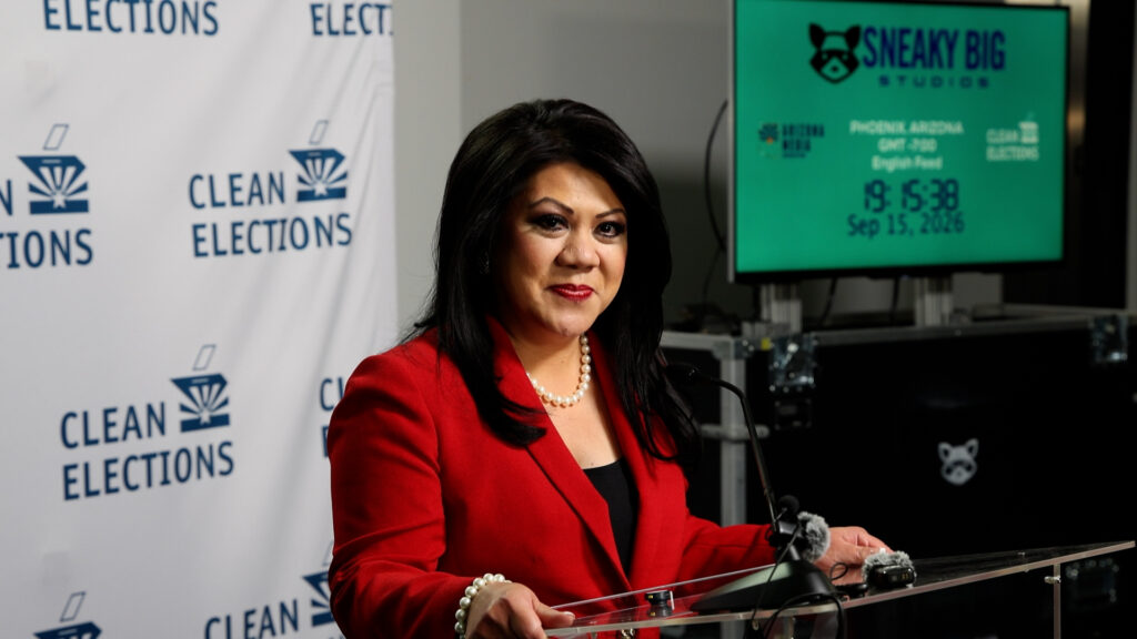 Yee at podium after debate